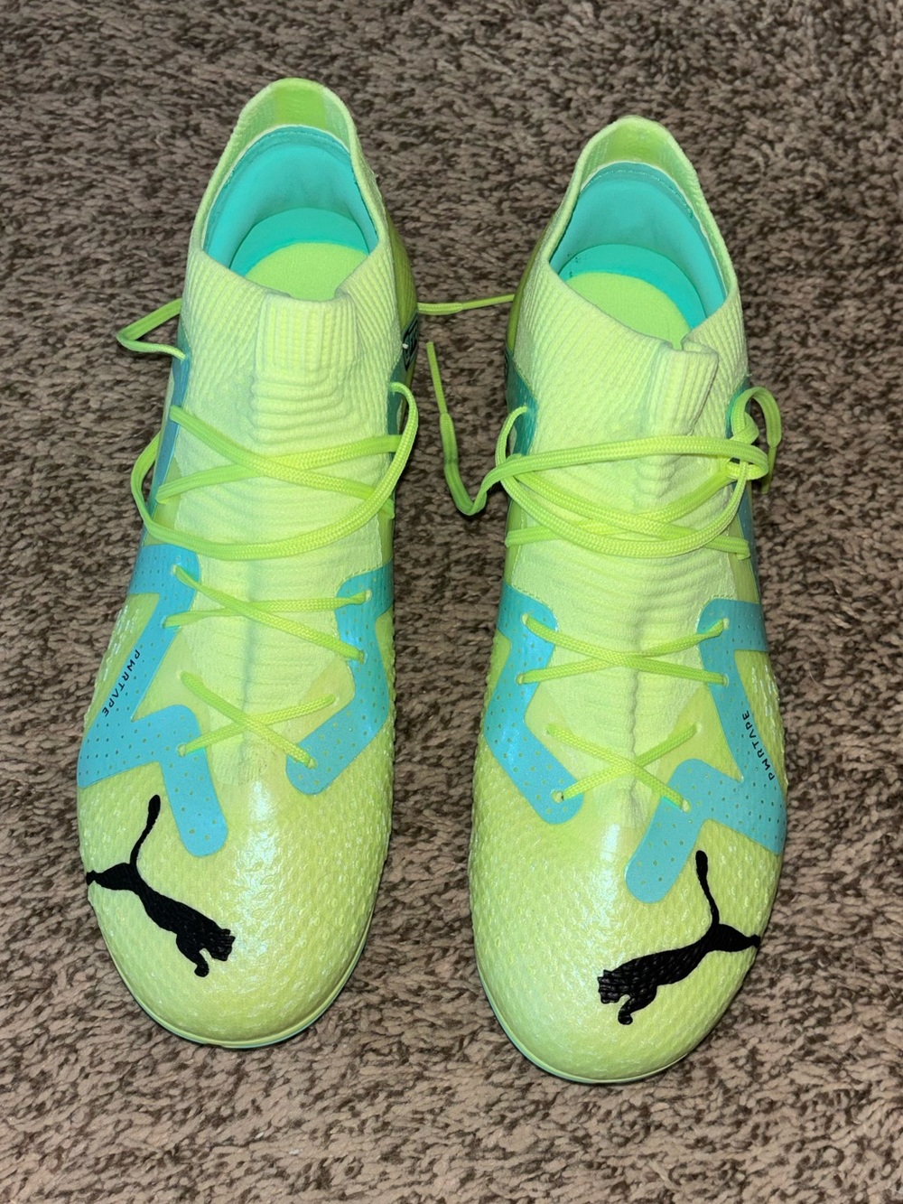 New/never worn! PUMA Neon Lime and Teal Soccer Cleats. Women’s 5.5/Youth size 4